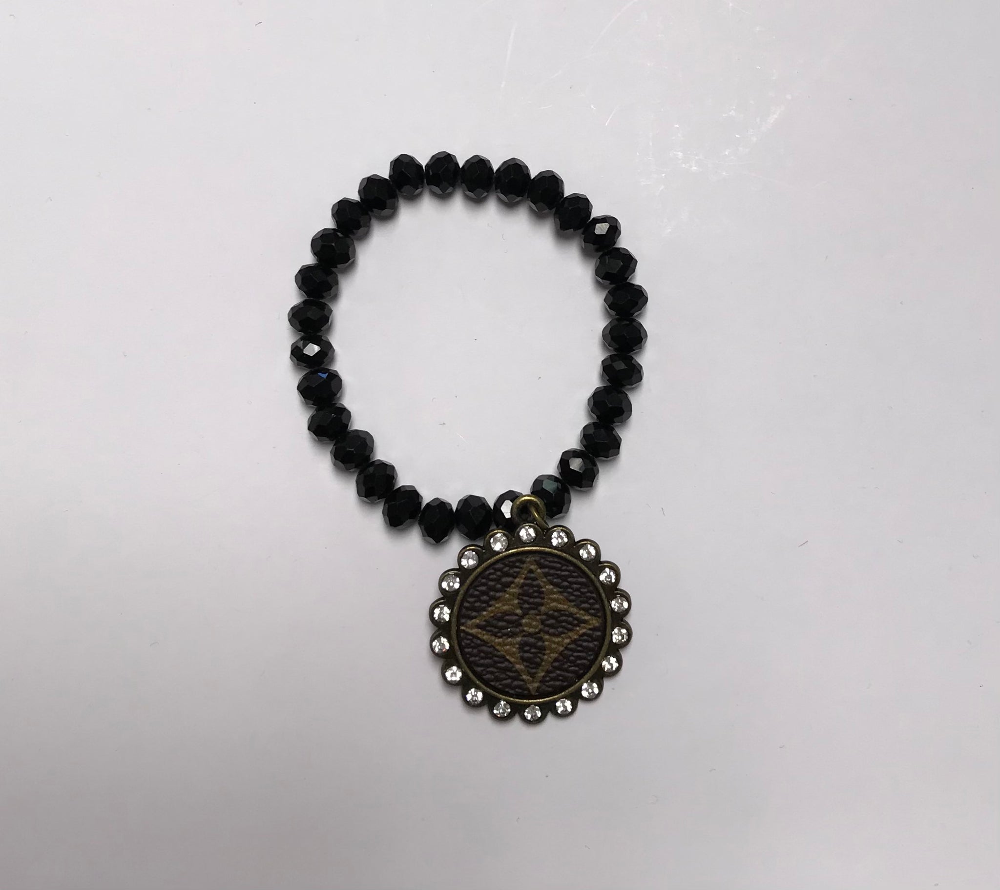Black Beaded LV Flower Pendant Stretch Bracelet